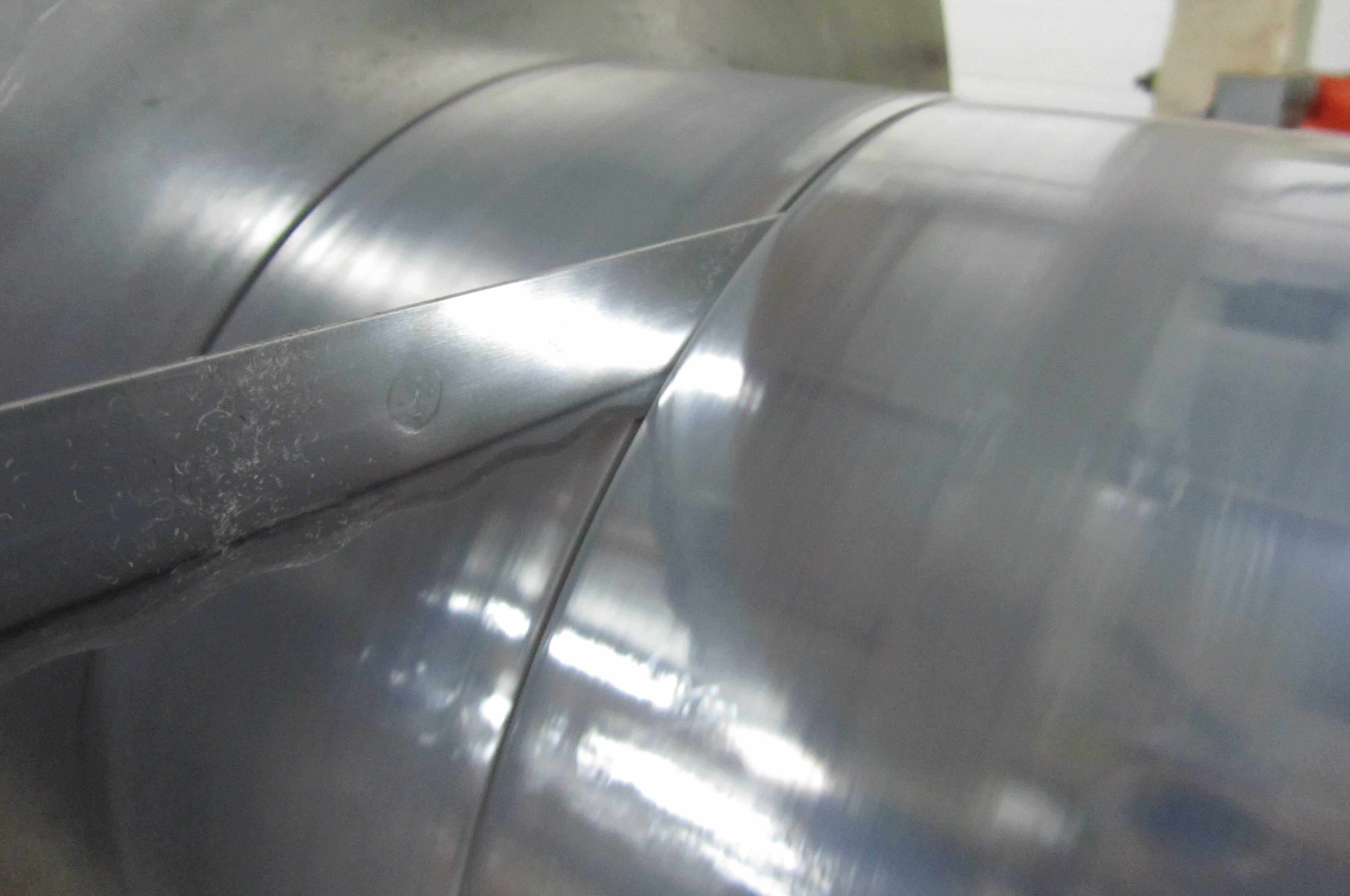 Slitting process for creating various widths of roll good coils